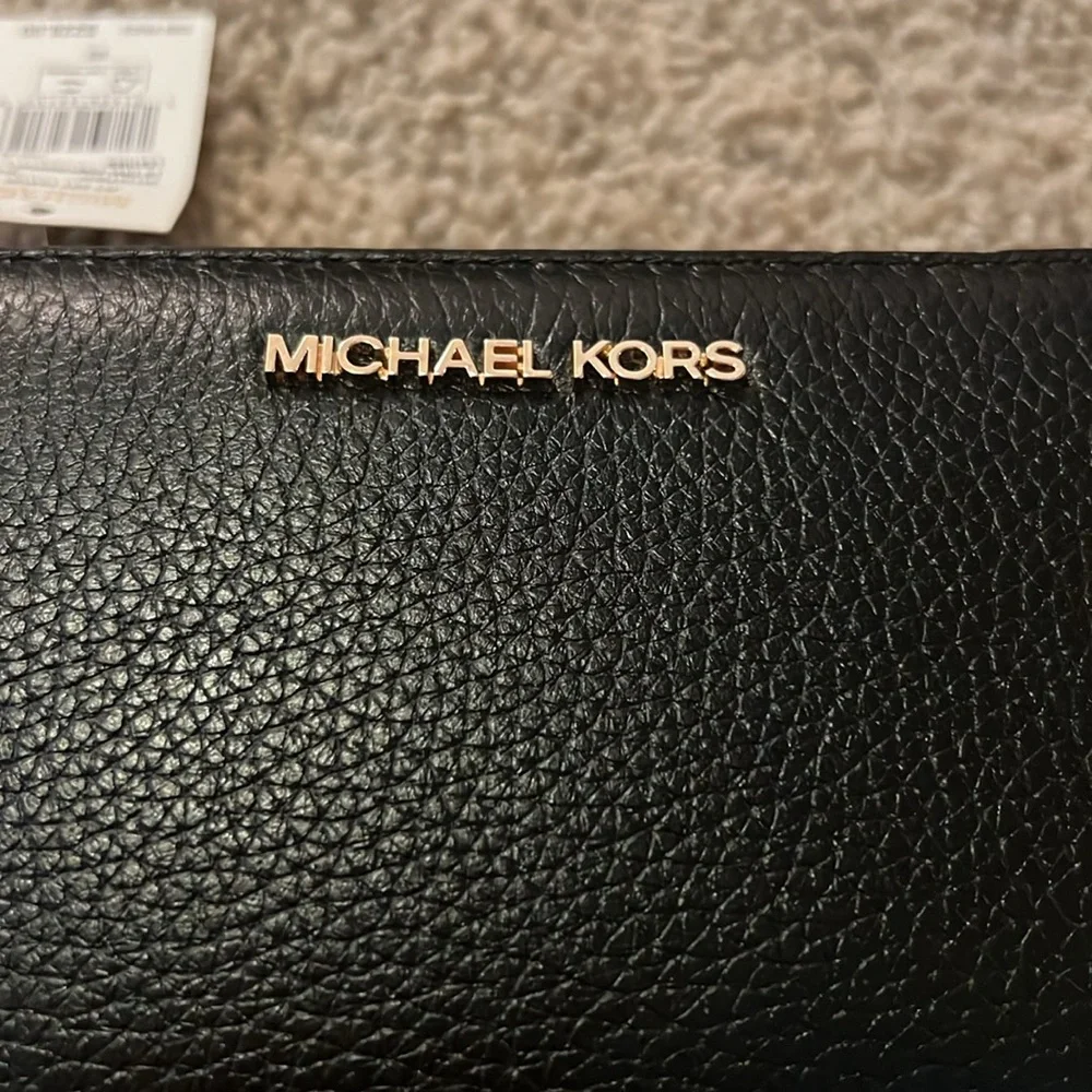 Michael Kors questions leave